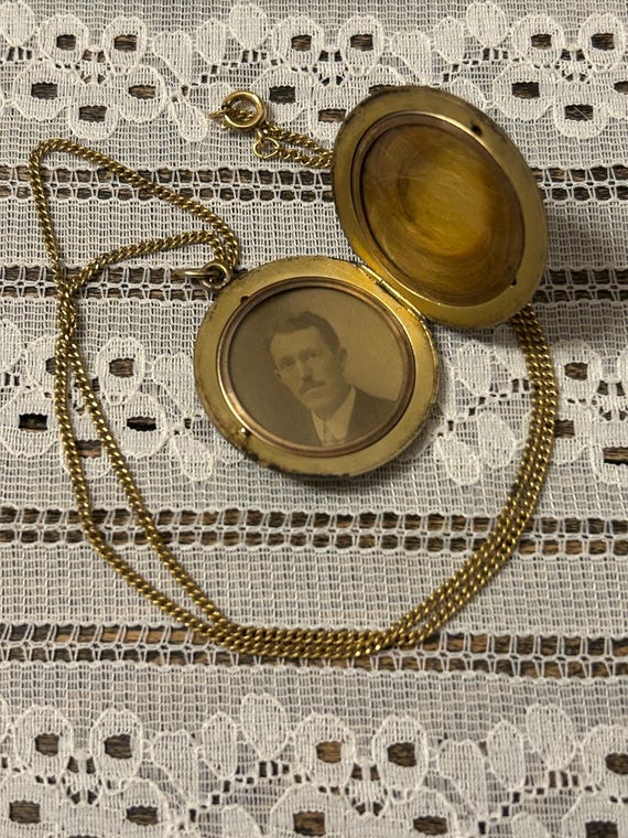Ornate Victorian photo locket with engraved initials and a lock of hair on a 20” chain