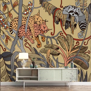 May include: A colorful jungle-themed mural featuring stylized illustrations of lynx, a raccoon, and various tropical plants. The artwork is rendered in shades of orange, brown, gray, and green, creating a vibrant and whimsical scene. The mural is mounted on a wall above a white cabinet.