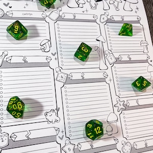 May include: A tabletop role-playing game character sheet with a whimsical mushroom theme. Several green, glittery dice are scattered across the sheet. The sheet includes sections for spellcasting, cantrips, and other game elements. The text includes "spellcasting class" and "spellcasting ability".