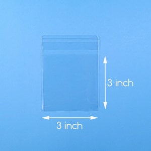May include: Clear plastic bag with a sealed opening. The bag measures 3 inches by 3 inches.