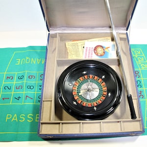 Vintage roulette game in case