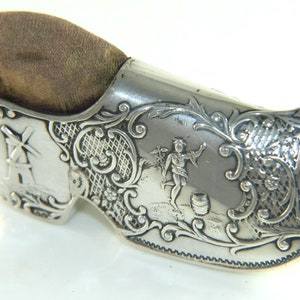 Antique solid silver figural pin cushion
