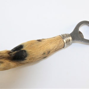 Antique deerfoot bottle opener