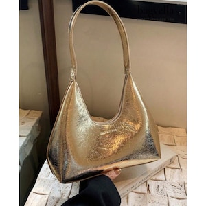 Goudkleurige metallic schoudertas, Slouchy Hobo-portemonnee, statement handtas