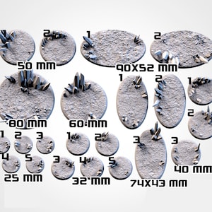 May include: A set of 10 round and oval-shaped bases for miniature figures, ranging in size from 25 mm to 90 mm. The bases are made of a light gray material and feature a textured surface with crystal-like accents.