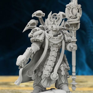 May include: A detailed, gray, 3D printed miniature of a fantasy character. The figure is wearing ornate armor and a long, flowing cloak. The character holds a staff topped with a skull and a flaming orb.