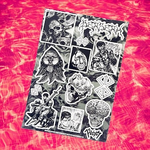 May include: A set of black and white stickers featuring characters and symbols from the anime series Berserk. The stickers include a skull with horns, a demon with tentacles, a character with a sword, and the Berserk logo.