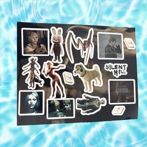 May include: A collection of stickers featuring characters and imagery from the Silent Hill video game series. The stickers are on a black background and include a woman with blonde hair, a pink bunny, a dog, a creature with long arms, and a man with a gun. The text "Silent Hill" is also included on the stickers.