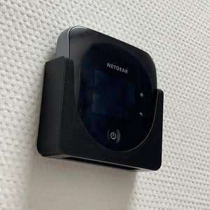 Wall mount holder for Netgear Nighthawk M1 M2 M5 M6 M6 pro WLAN router self-adhesive image 1