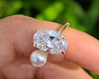 Bague Ariana Grande, bague de fiançailles en or massif 14 carats avec moissanite taille ovale et perle latérale, bague de célébrité, bague deux pierres, bague de promesse