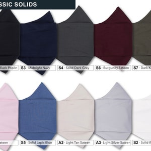 May include: A collection of 10 fabric swatches in various colors, including black, navy, gray, burgundy, green, pink, blue, tan, silver, and white. The swatches are labeled with their corresponding colors and fabric types, such as "Solid Black Poplin", "Midnight Navy", and "Burgundy Sateen".