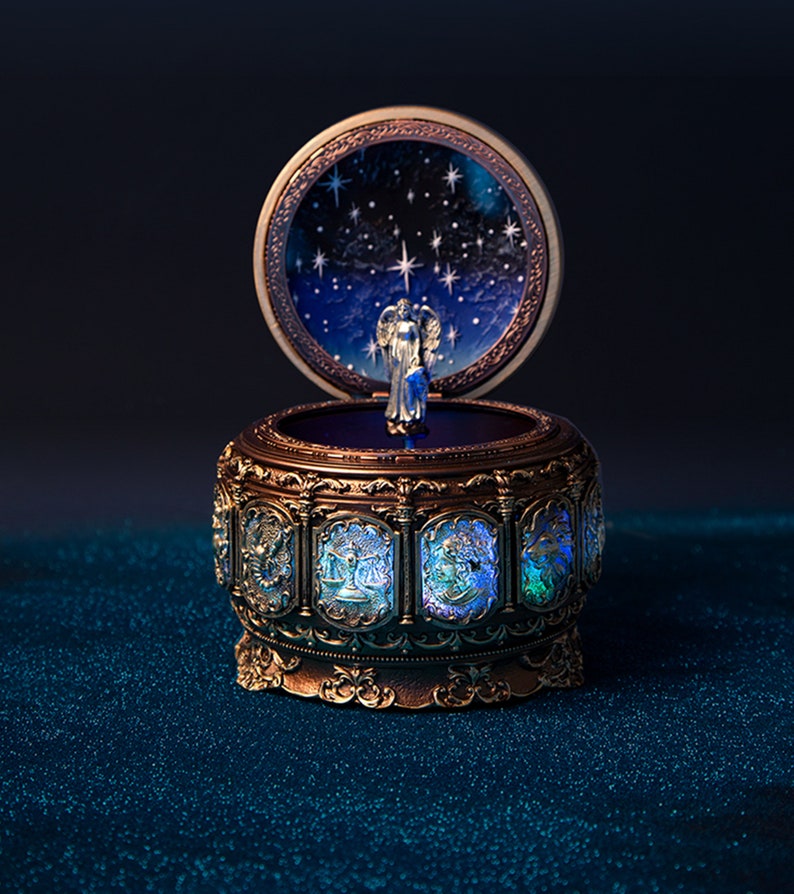 Twinkling LED Light Rotate Music Box,Vintage Music Box with 12 Constellations Rotating Goddess,Resin Carved   Musical Box Gift for Birthday 
