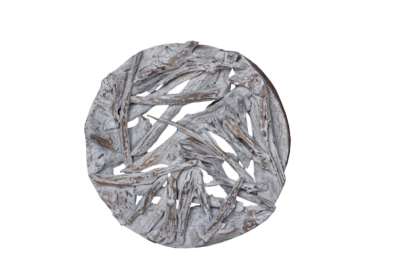 May include: Whitewashed driftwood arranged in a circular pattern, creating a decorative wall hanging. The wood is weathered and has a rustic appearance.