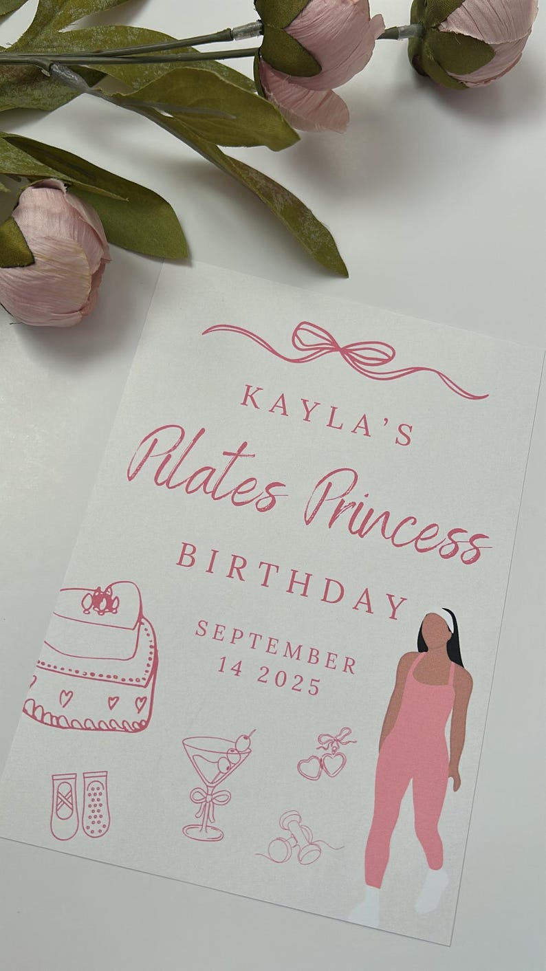 May include: A white card with pink text and illustrations. The text reads "Kayla's Pilates Princess Birthday September 14 2025." Illustrations include a purse, ballet slippers, a cocktail, hearts, dumbbells, and a woman in a pink jumpsuit.