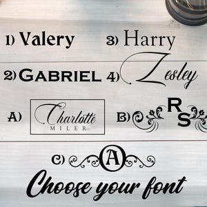 May include: Image featuring various font options for personalized text. Includes examples of names like "Valery," "Gabriel," "Harry," and "Lesley" in different styles. The phrase "Choose your font" is also displayed.