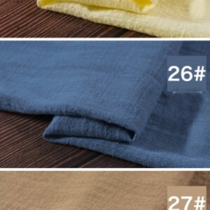 May include: Three fabric swatches in different colors: a pale yellow, a medium blue, and a light brown. Each swatch is folded in half and labeled with a number: 25#, 26#, and 27#.