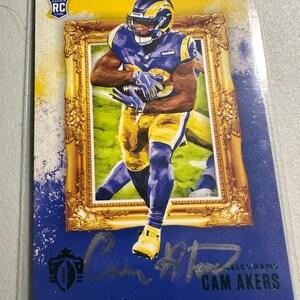 Tarjeta autografiada de Cam Akers
