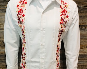 May include: White long-sleeve button-up shirt with red and gold floral embroidery on the front.