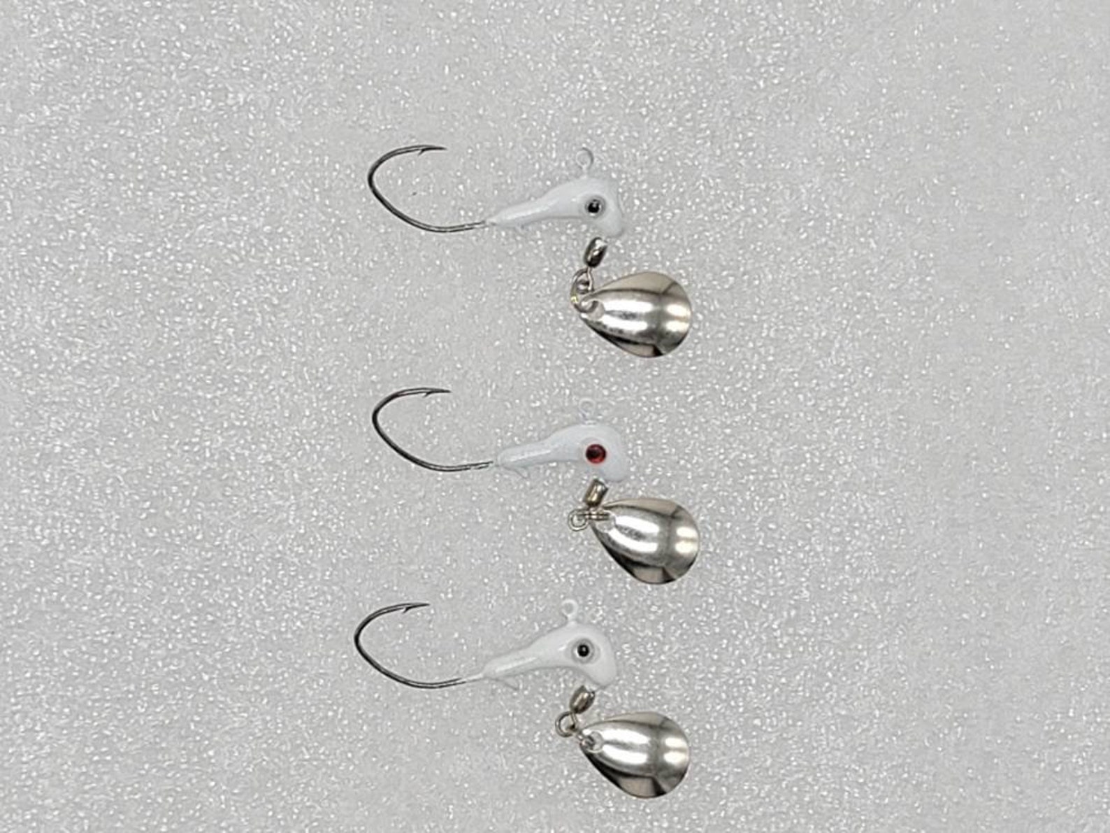 Hand Poured Horse Head jigs with under spin blades. For Etsy