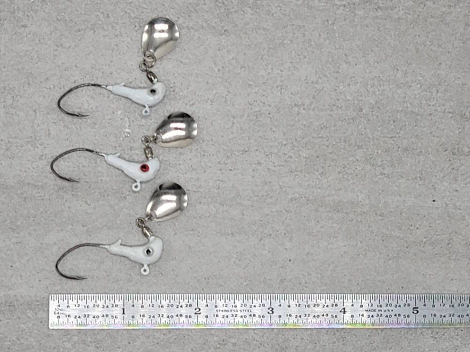 Hand Poured Horse Head jigs with under spin blades. For Etsy