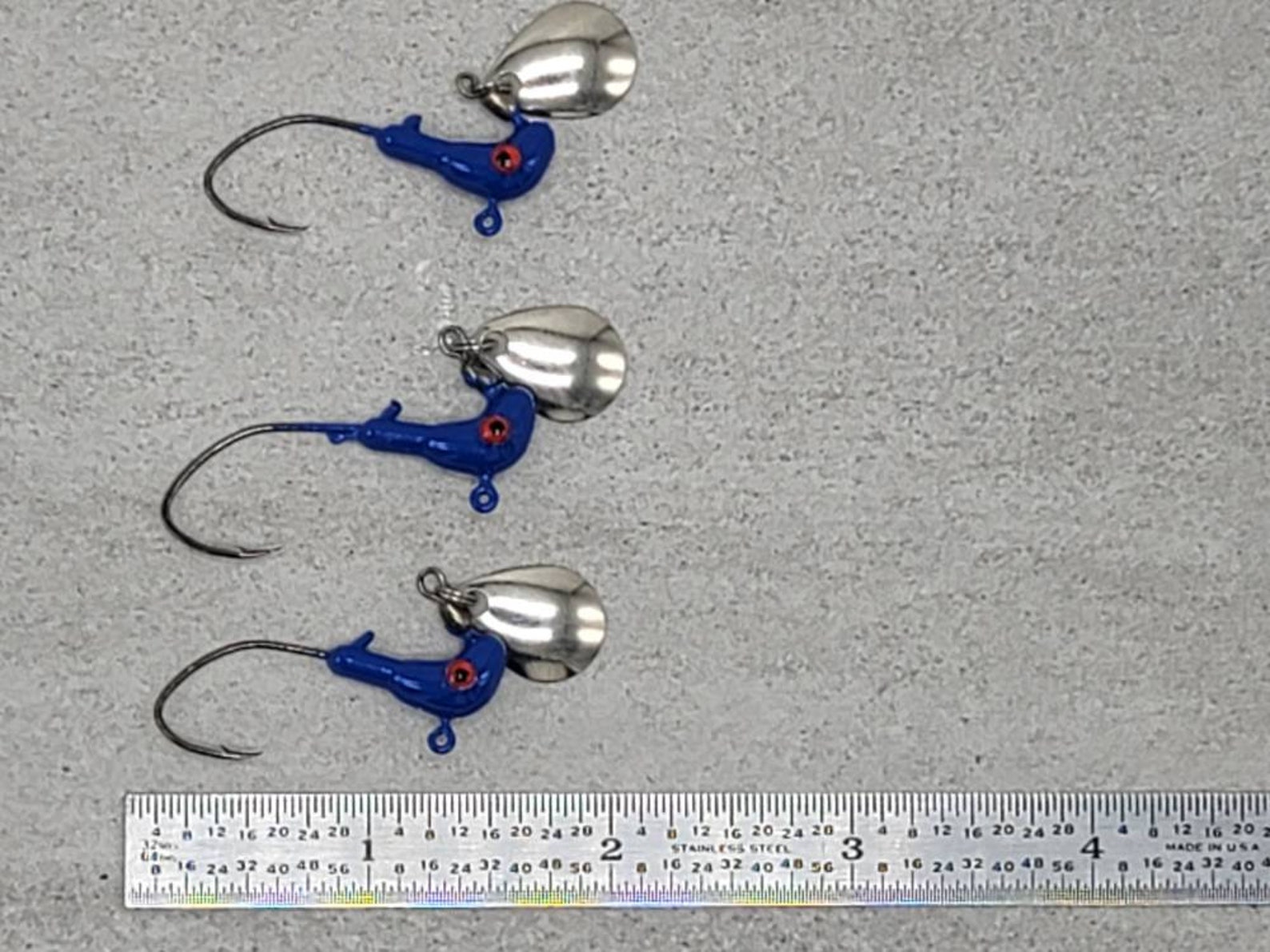 Hand Poured Horse Head jigs with under spin blades. For Etsy