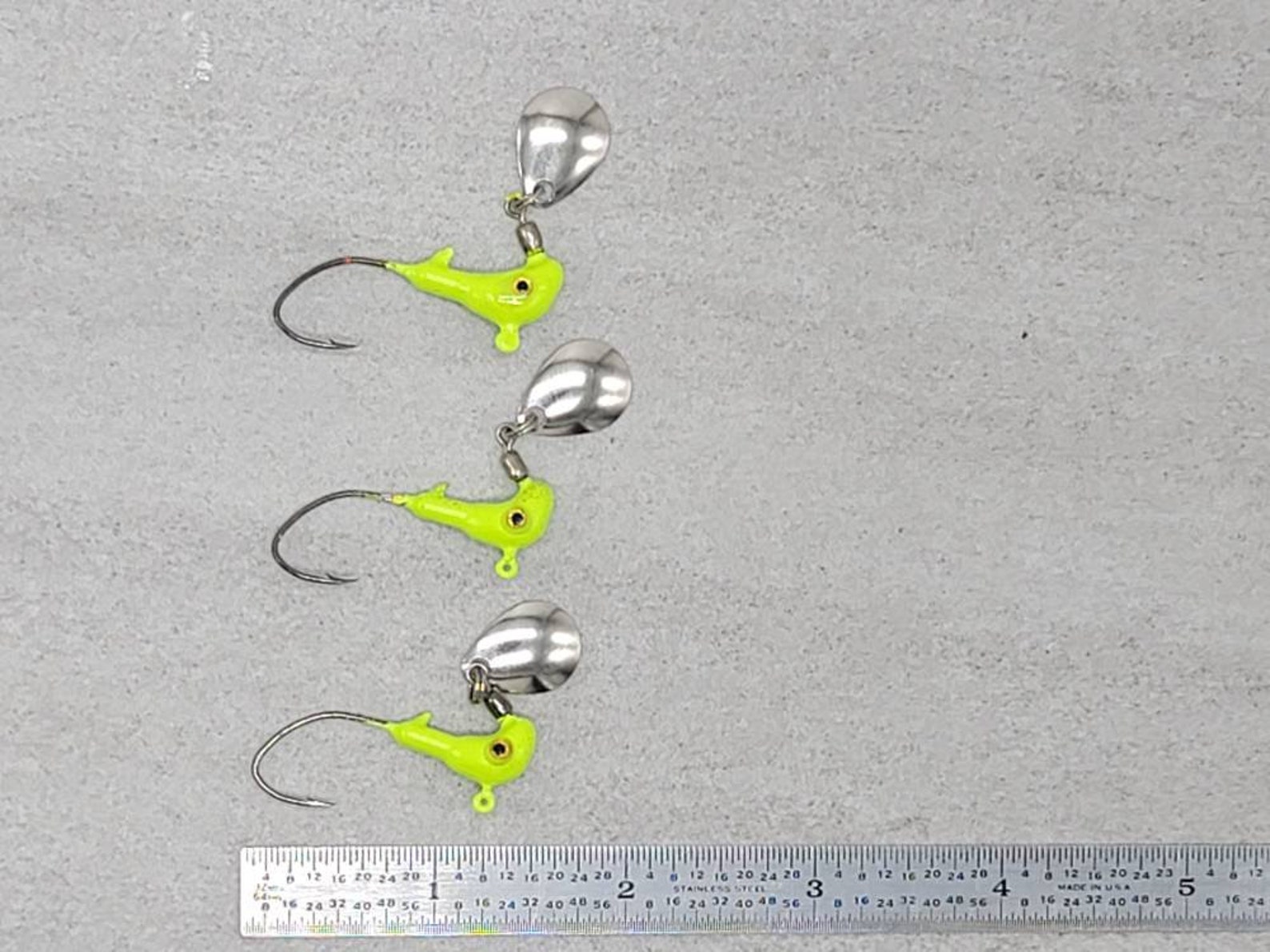 Hand Poured Horse Head jigs with under spin blades. For Etsy