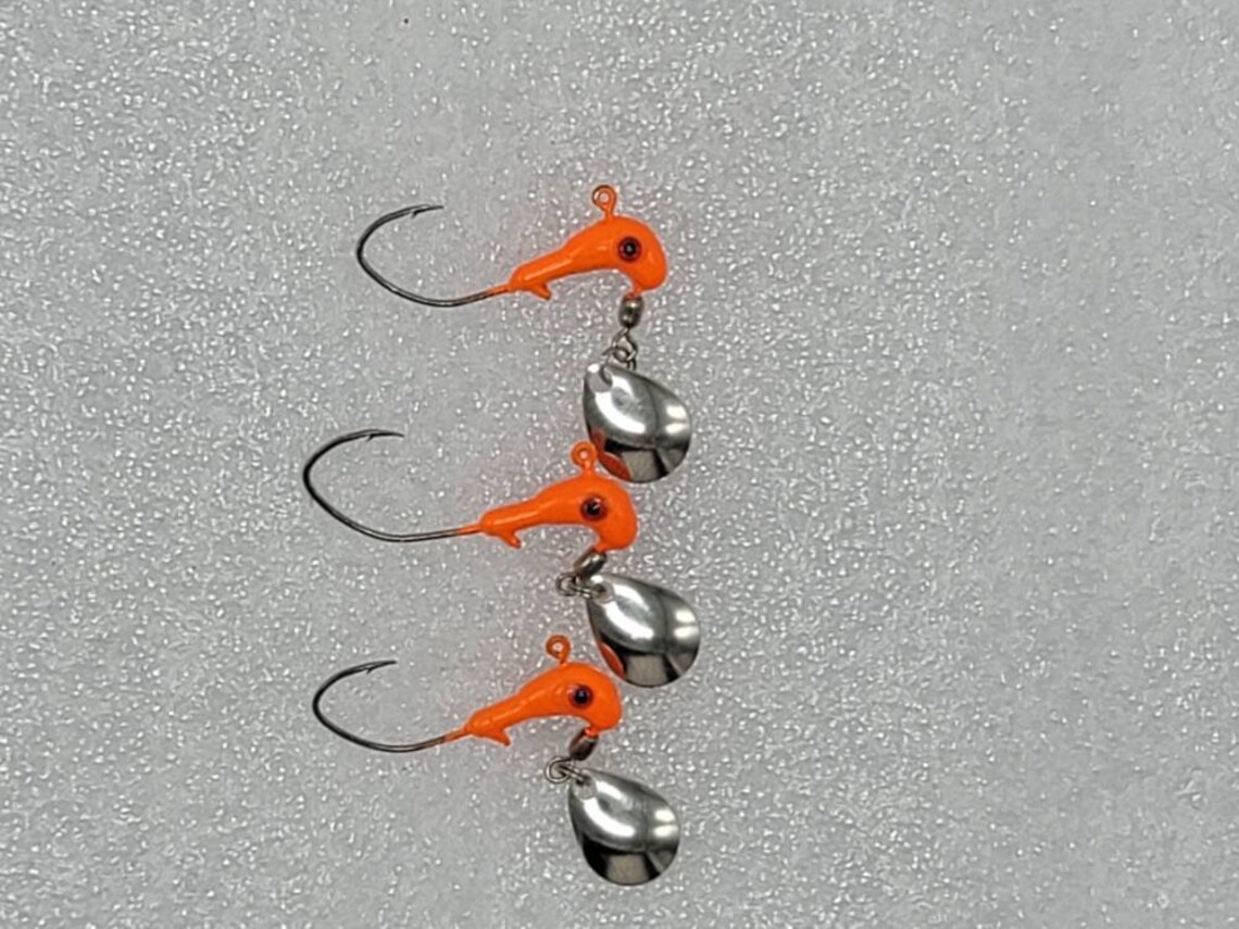 Hand Poured Horse Head jigs with under spin blades. For Etsy