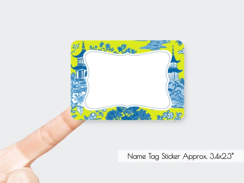 May include: A rectangular name tag sticker with a white center and a decorative border. The border is lime green with a blue and white Asian-inspired pattern. The sticker is approximately 3.4 x 2.3 inches.