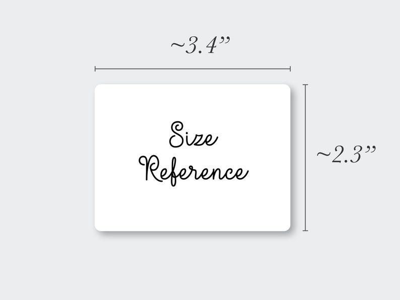 May include: A white rectangular card with the words "Size Reference" in black script. The card measures approximately 3.4 inches wide and 2.3 inches high. The card is on a light gray background.