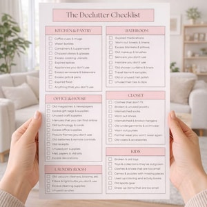 May include: A declutter checklist with categories like Kitchen & Pantry, Bathroom, Office & House, Closet, Laundry Room, and Kids. The checklist is printed on a white paper with pink headings and black text.