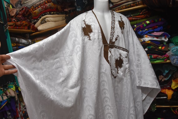 mauritania women dress The Materiality and Social Agency of the Malafa (Mauritanian Veil) | African Studies Review Adugen Origei Mauritania Flag Sleeveless