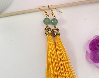 Yona earrings with jade beads and orange gold tassels