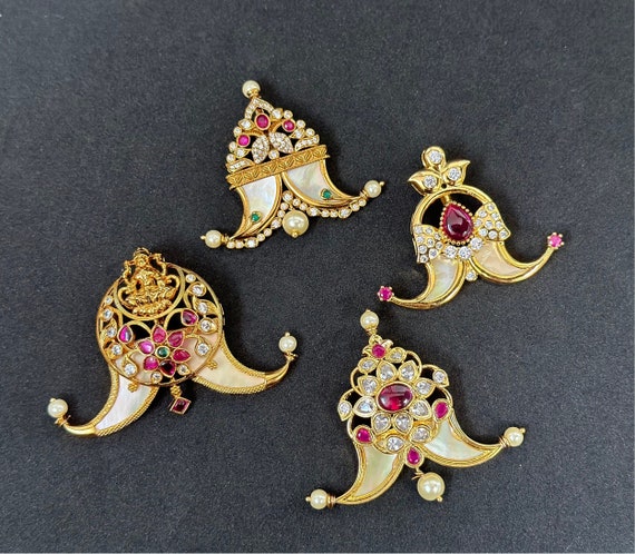 Buy AVANI Gold Faux Tiger Claw Sunburst Pendant Online in India -  BeKarmic.com