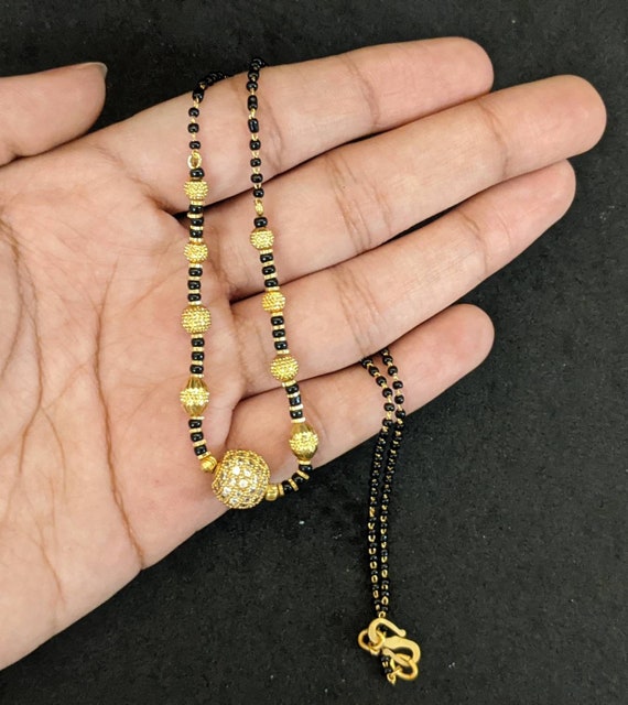 Radha's Creations karimani bangles one gram gold - Radhas Creations -  666887 | Bangles, Black beaded jewelry, Fancy jewelry necklace
