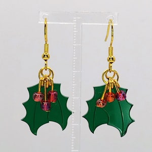 Holly leaves and berries Christmas earrings; perfect secret Santa gift, stocking filler or accessory for a seasonal party.