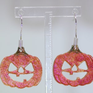 Pumpkin Halloween Earrings; Celebrate All Hallows' eve with these spooky Jack O' Lantern squash earrings, perfect for a Samhain party.