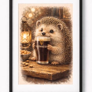 May include: A framed print featuring a charming hedgehog holding a pint of Guinness. The hedgehog is depicted with a warm, inviting expression, seated at a wooden table with a bowl of peanuts and a lit lantern. The Guinness glass is prominently displayed.