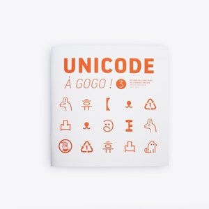 May include: A white booklet with the title "UNICODE A GOGO! 3" and a collection of orange line drawings of various symbols and characters.