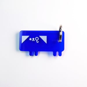 Kaomoji Acryl-Schlüsselanhänger Hund "Sherlock potiche"