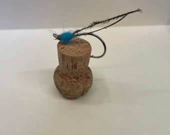 Set de 2 señuelos de pesca con mosca, ideal para truchas o lubinas. Lanzamiento de pavo real