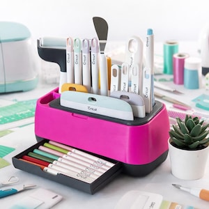 May include: A set of three ceramic mugs with a speckled, matte finish. The mugs are in shades of cream, light gray, and dark gray. Each mug has a simple, minimalist design, perfect for coffee or tea.