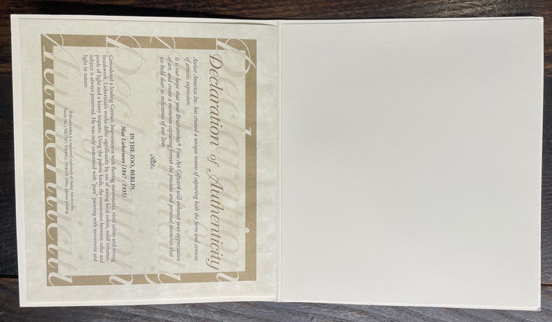 May include: A Declaration of Authenticity document, featuring text in English, with a cream-colored border and a blank white page. The text includes the artist's name, Max Liebermann, and the location, In the Zoo, Berlin.
