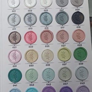 May include: A color chart of 50 wax seal stamps with a leaf design. The chart is labeled "Pastel Serisi" and each stamp is numbered from 001 to 059.