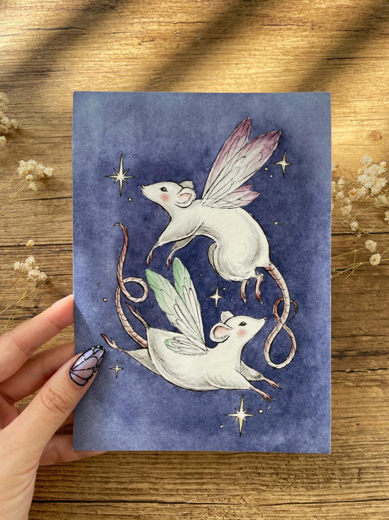 May include: A whimsical illustration of two white mice with fairy wings, set against a deep blue background with twinkling stars. The mice are depicted in mid-flight, with delicate wings in shades of pink and green. The artwork evokes a sense of fantasy and charm.