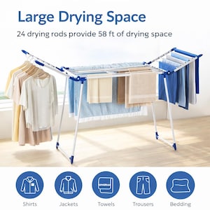 Puede incluir: Un tendedero blanco y azul con 24 varillas que proporcionan 17,68 metros de espacio para secar. El tendedero sostiene camisas, chaquetas, toallas, pantalones y ropa de cama. El texto "Large Drying Space" está en la parte superior.