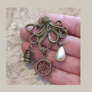 Fun Pirate Octopus Bronze Brooch! With a Pearl Drop, Ships Wheel, and Sailor's Lantern. Historically Fantasy Inspired.