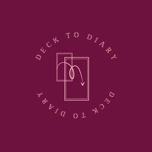 May include: A logo for a business called "Deck to Diary" featuring a stylized image of two cards with an arrow pointing down. The logo is in a circle with the business name repeated around the circle.