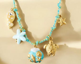 Gold charm necklace • charm necklace • stainless steel necklace • gold charm necklace • seashell, sea turtle, coral…
