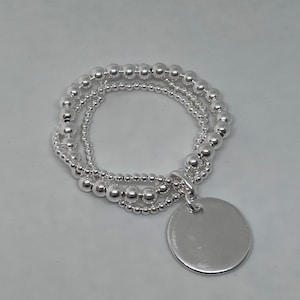 Triple row pearl bracelet 925 silver round medal