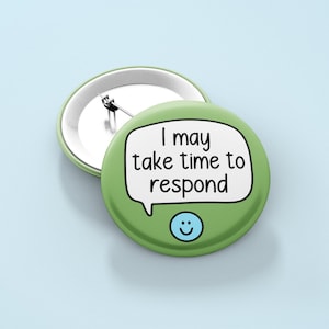 May include: Green button with a white speech bubble that says "I may take time to respond" and a blue smiley face.